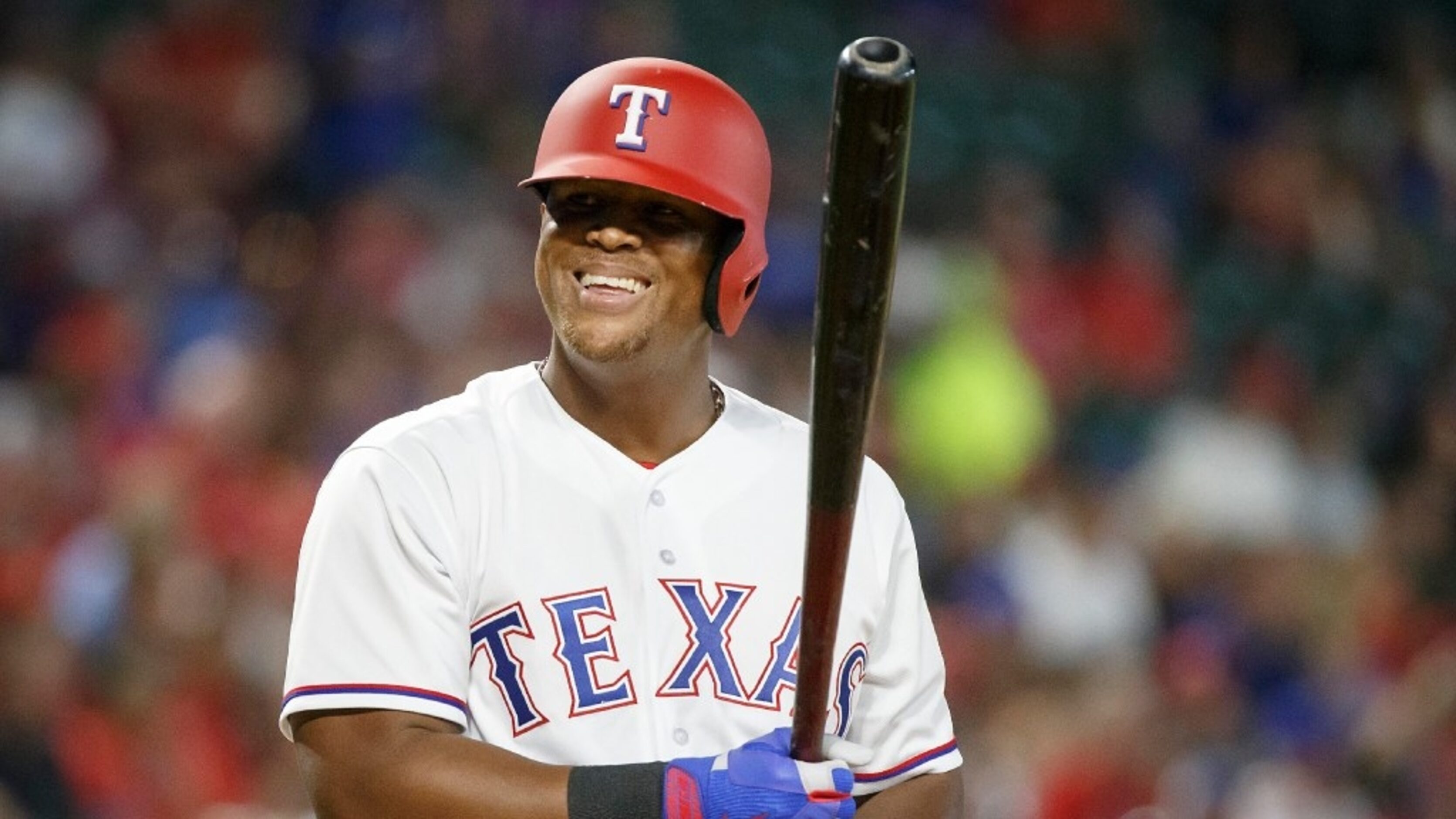 Texas Rangers third baseman Adrian Beltre smiles as he steps into the batters box during the...