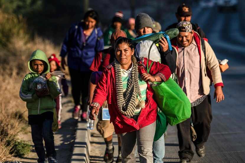 Central American migrants taking part in a caravan to the U.S. arrive in Tijuana, Mexico,...