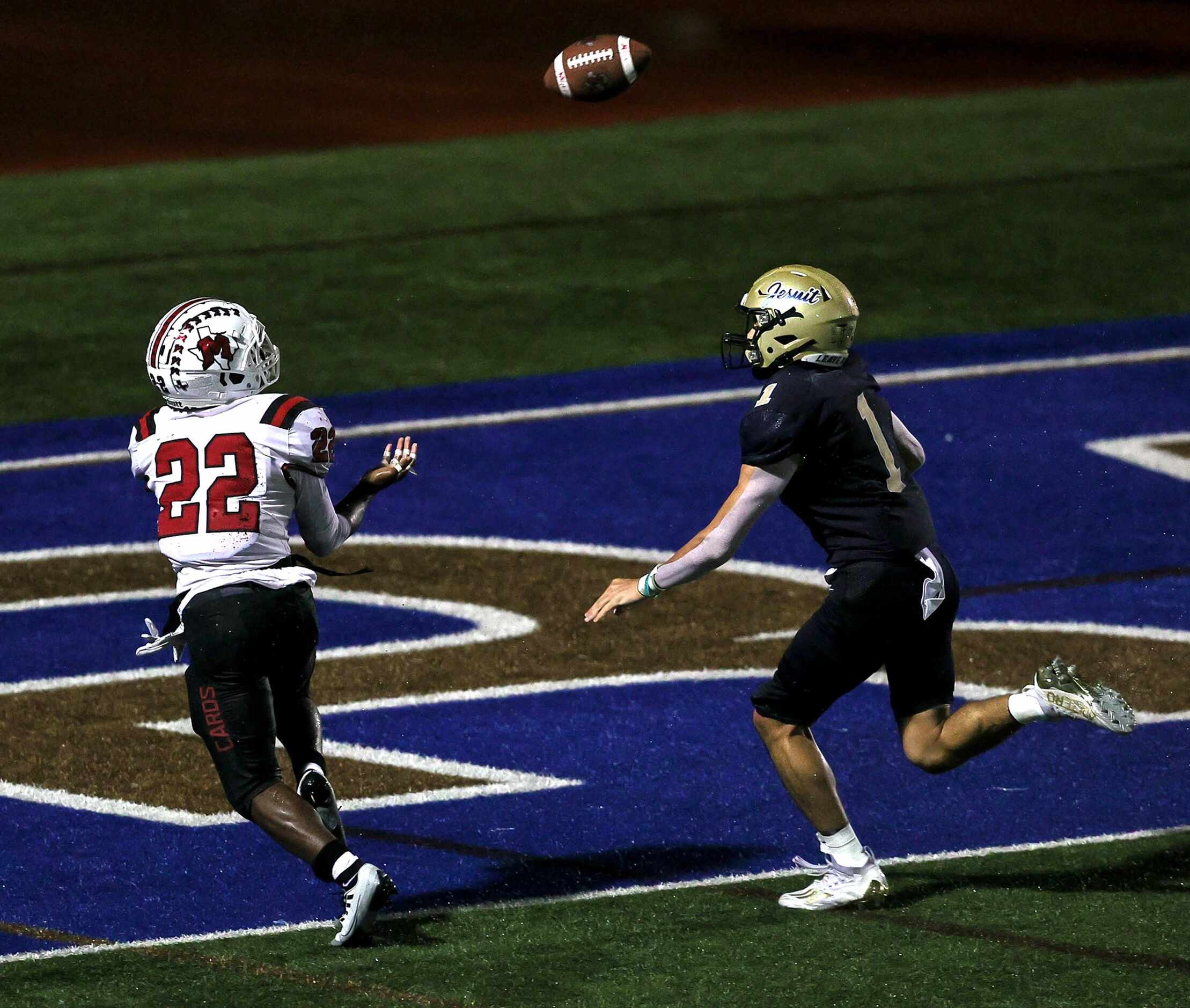 MacArthur running back Jerbrandin Henderson (22) comes up with a 19 yard touchdown reception...