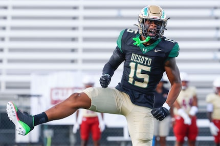 DeSoto High’s Keylan Abrams cheers after he brought down Creekside High School (Ga.) Cayden...