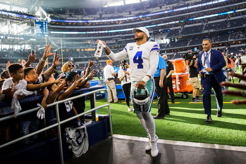 Dallas Cowboys quarterback Dak Prescott (4) leaves the field after a 35-17 win over the New...