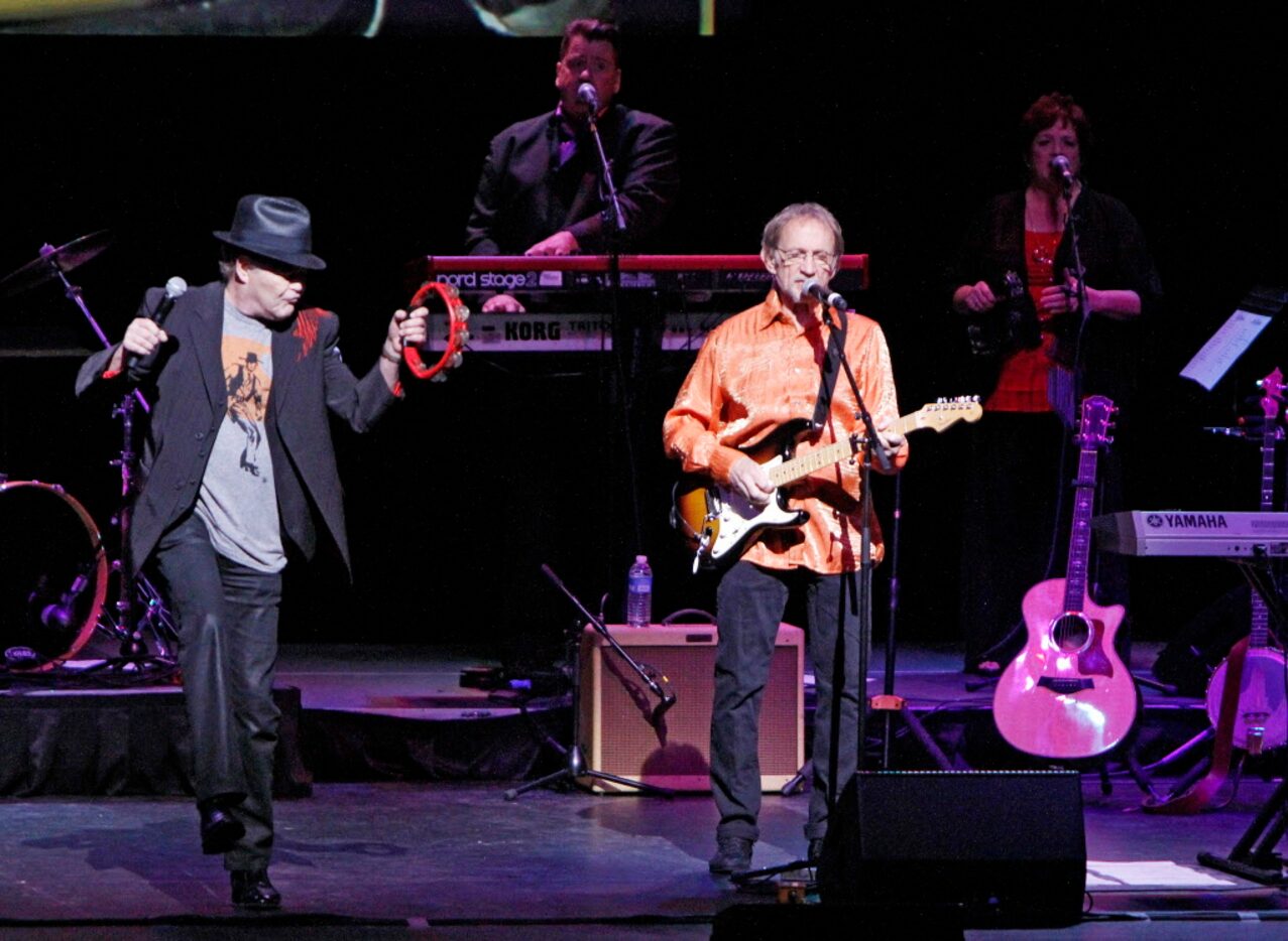 Mickey Dolenz, left, and Peter Tork, of the musical group The Monkees, perform on Tuesday,...