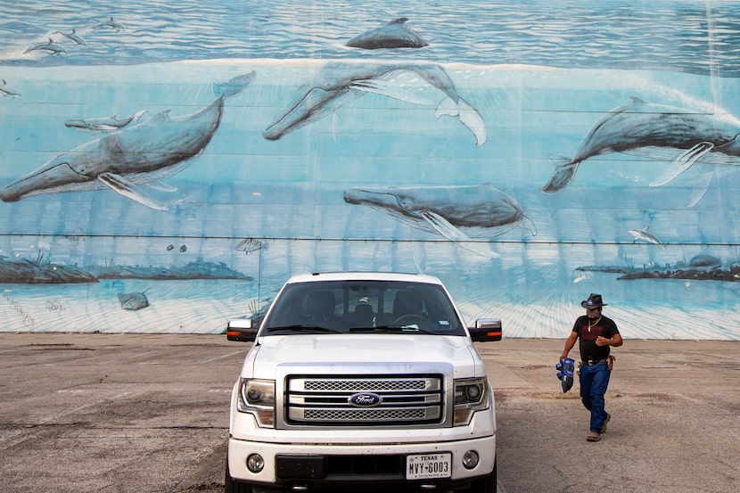 After recent advertising posters came down, a mural painted in 1999 by the artist and...