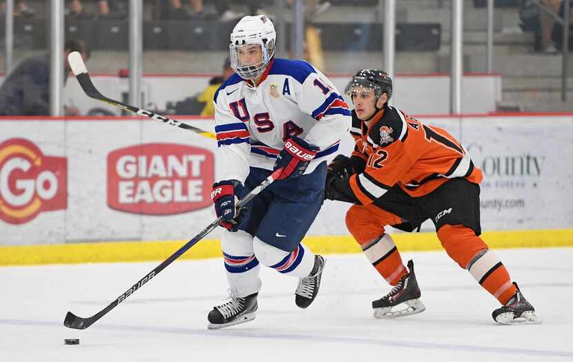 CRANBERRY TOWNSHIP, PA - SEPTEMBER 30: Oliver Wahlstrom #18 of Team USA skates with the puck...