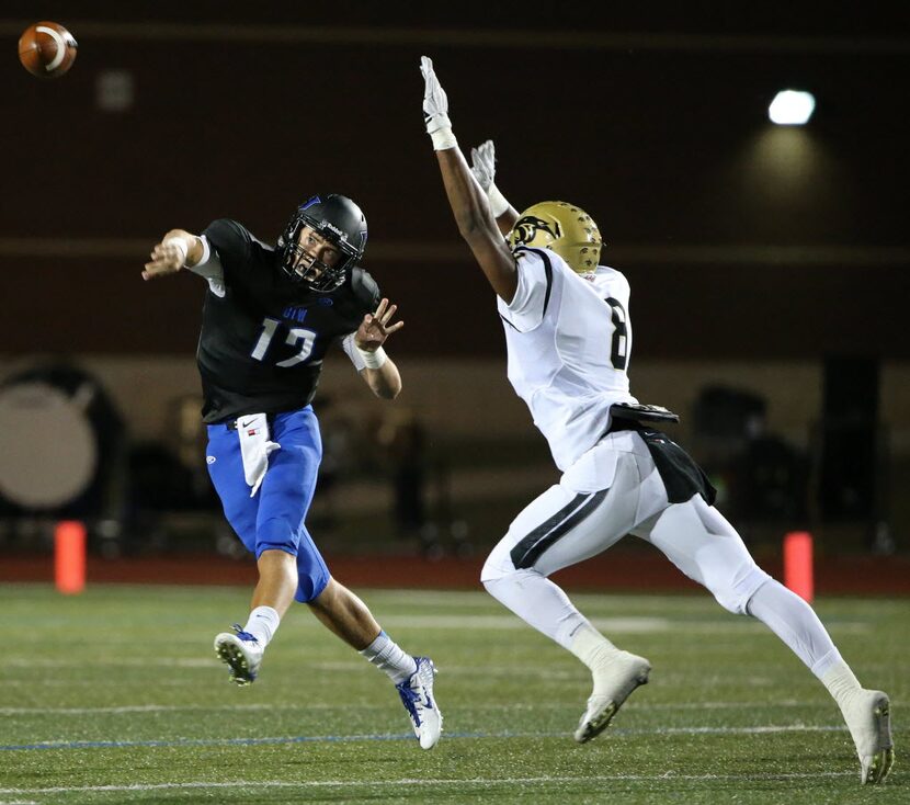 Hebron quarterback Clayton Tune (12) throws the ball while being covered by Plano East...