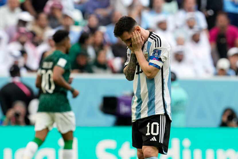 Argentina's Lionel Messi reacts disappointed during the World Cup group C soccer match...