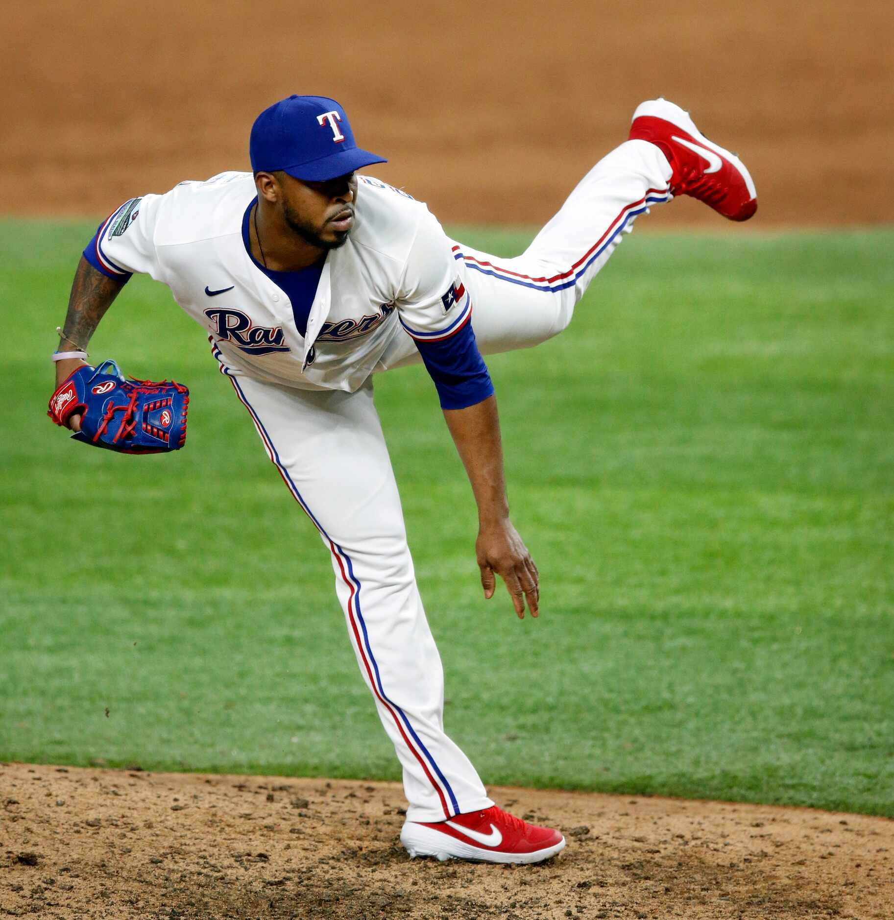 Texas Rangers relief pitcher Joely Rodriguez (57) throws against the San Diego Padres during...