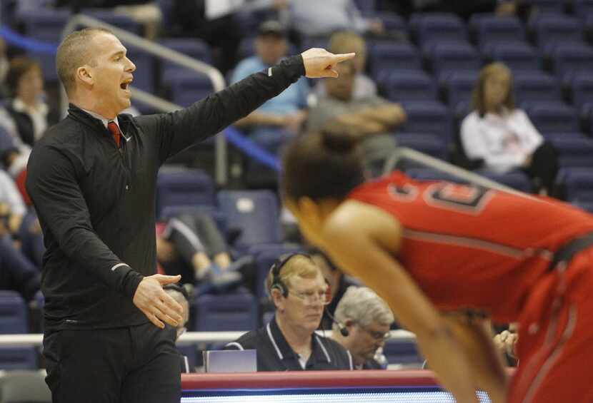 Frisco Liberty head coach Ross Reedy speaks to his team during the UIL Girls State...
