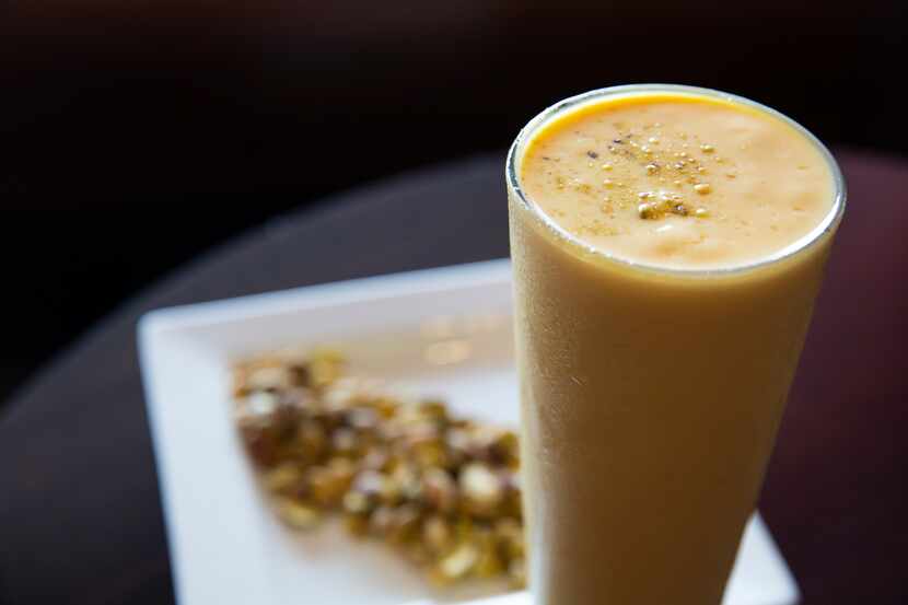 Mango lassi at India Palace in North Dallas combines mango and yogurt, topped with pistachios.