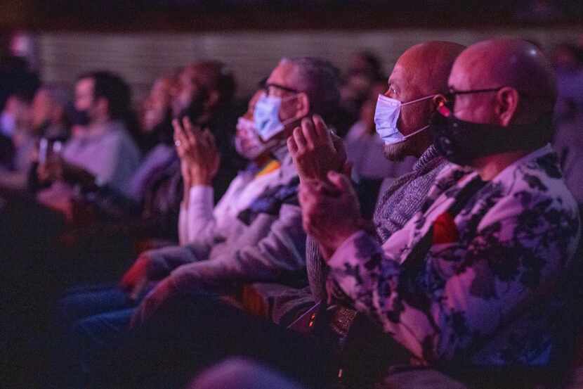 Audience members clap during the "Rose Room on the Road" drag show at the Winspear Opera...