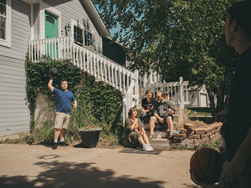 Jessica Patterson at home with her husband and four kids in Olathe, Kan.