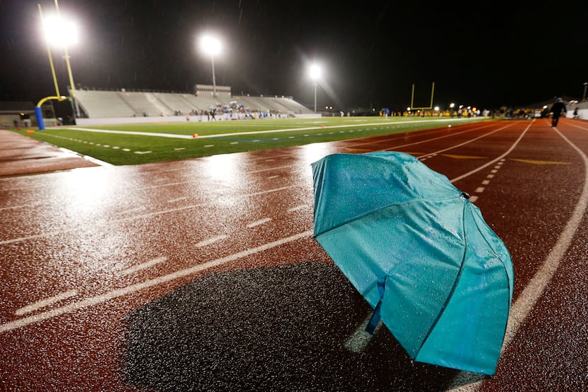 An umbrella rests on the track shortly before the start of the Garland and Garland Lakeview...