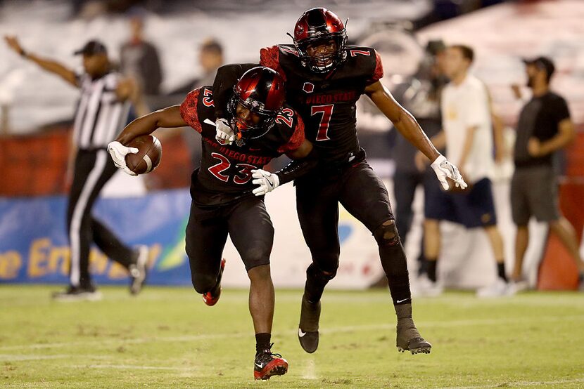 SAN DIEGO, CA - SEPTEMBER 10: Damontae Kazee #23 and Kameron Kelly #7 of the San Diego State...