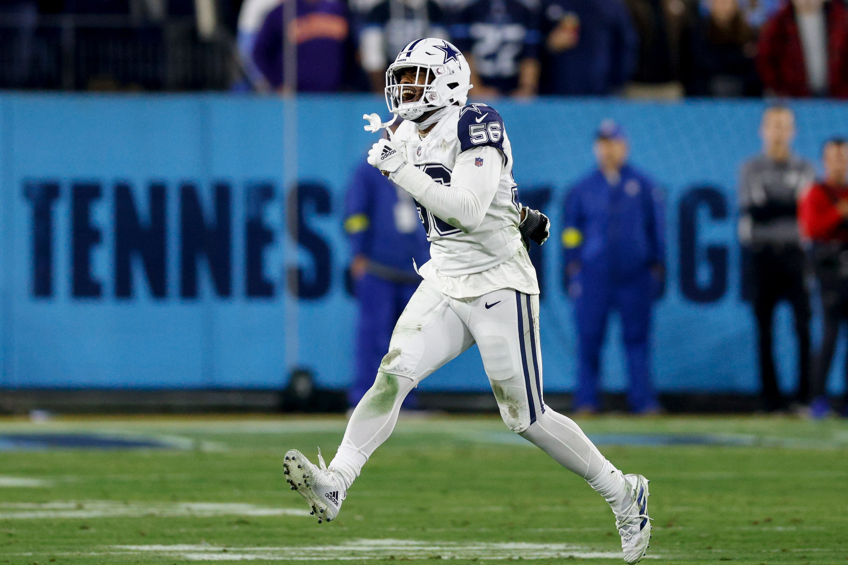 Dallas Cowboys defensive end Dante Fowler Jr. (56) celebrates a forced fumble and sack from...