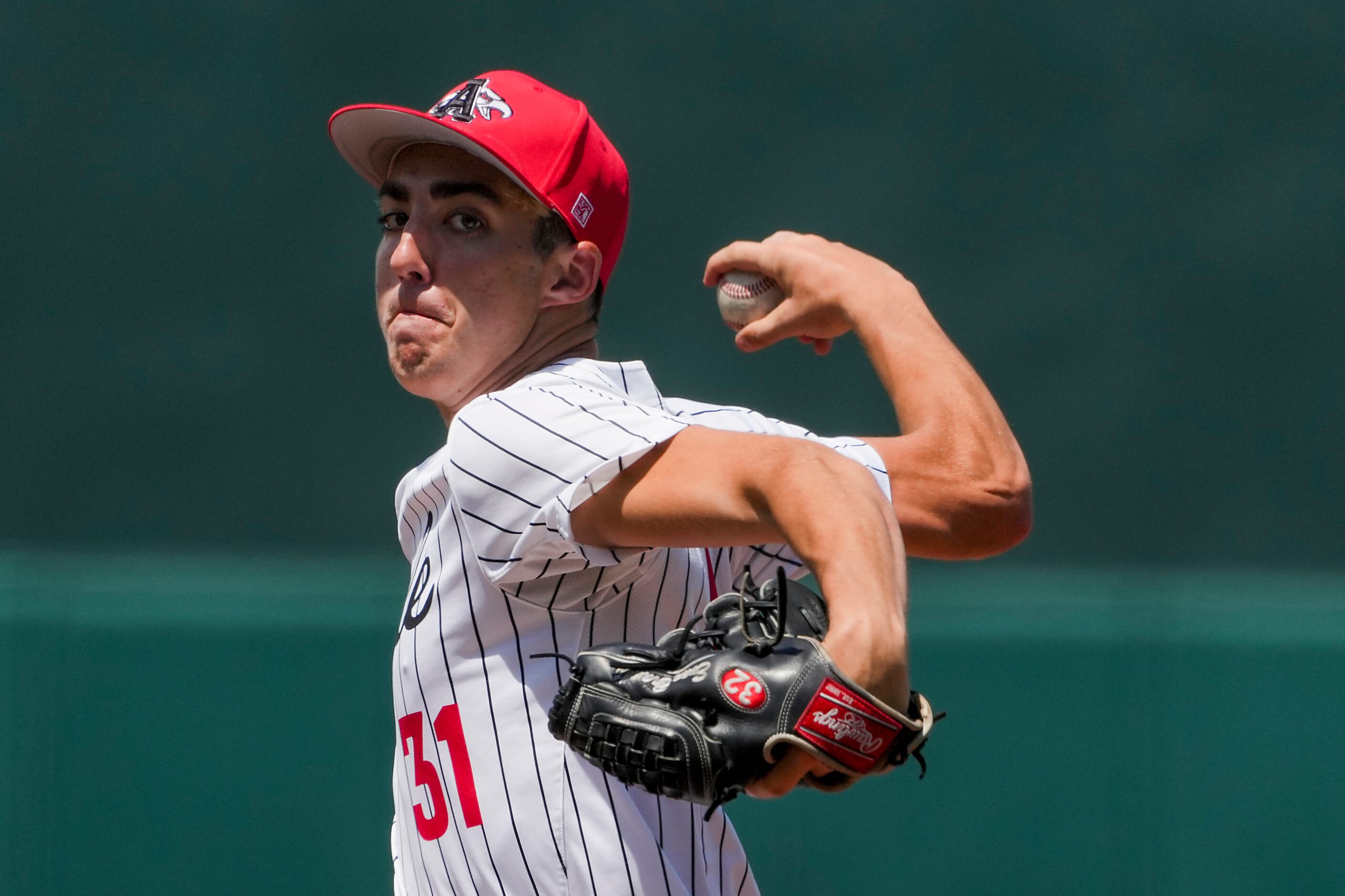 Argyle pitcher Evan Brandt delivers during the seventh inning of a UIL 4A baseball state...