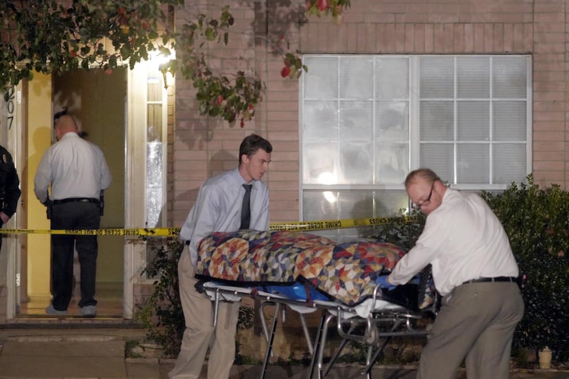 
Police at the scene of an accidental shooting in Arlington on December 4, 2014. A...