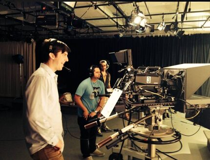 Trevor Cadigan (left) behind the camera at SMU. 