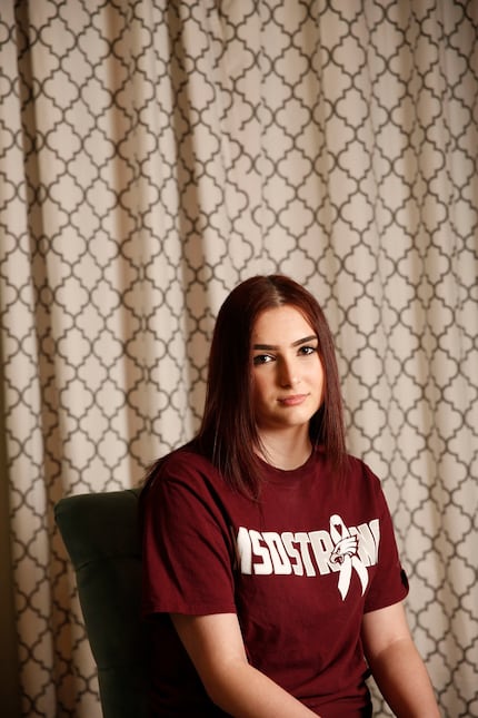 Katie Silverman, a senior at Carroll Senior High School, poses for a photograph at her home...