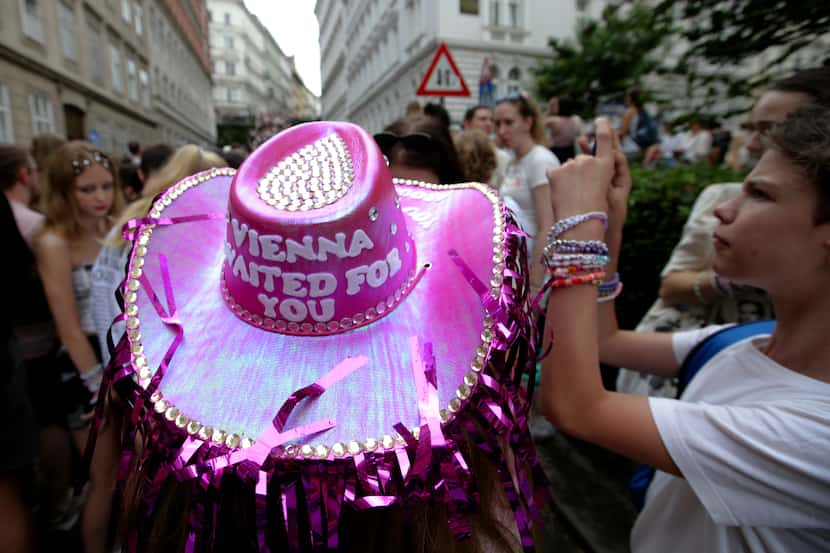 A person wears a hat as Swifties gather and sing in central Vienna on Thursday, August 8,...