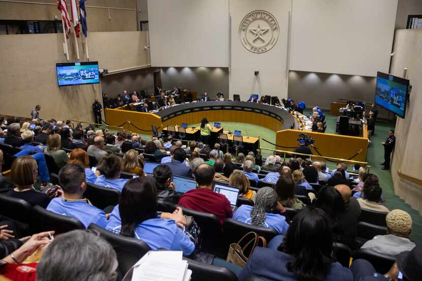 The Dallas City Council listens to public comment at Dallas City Hall in December 2023.