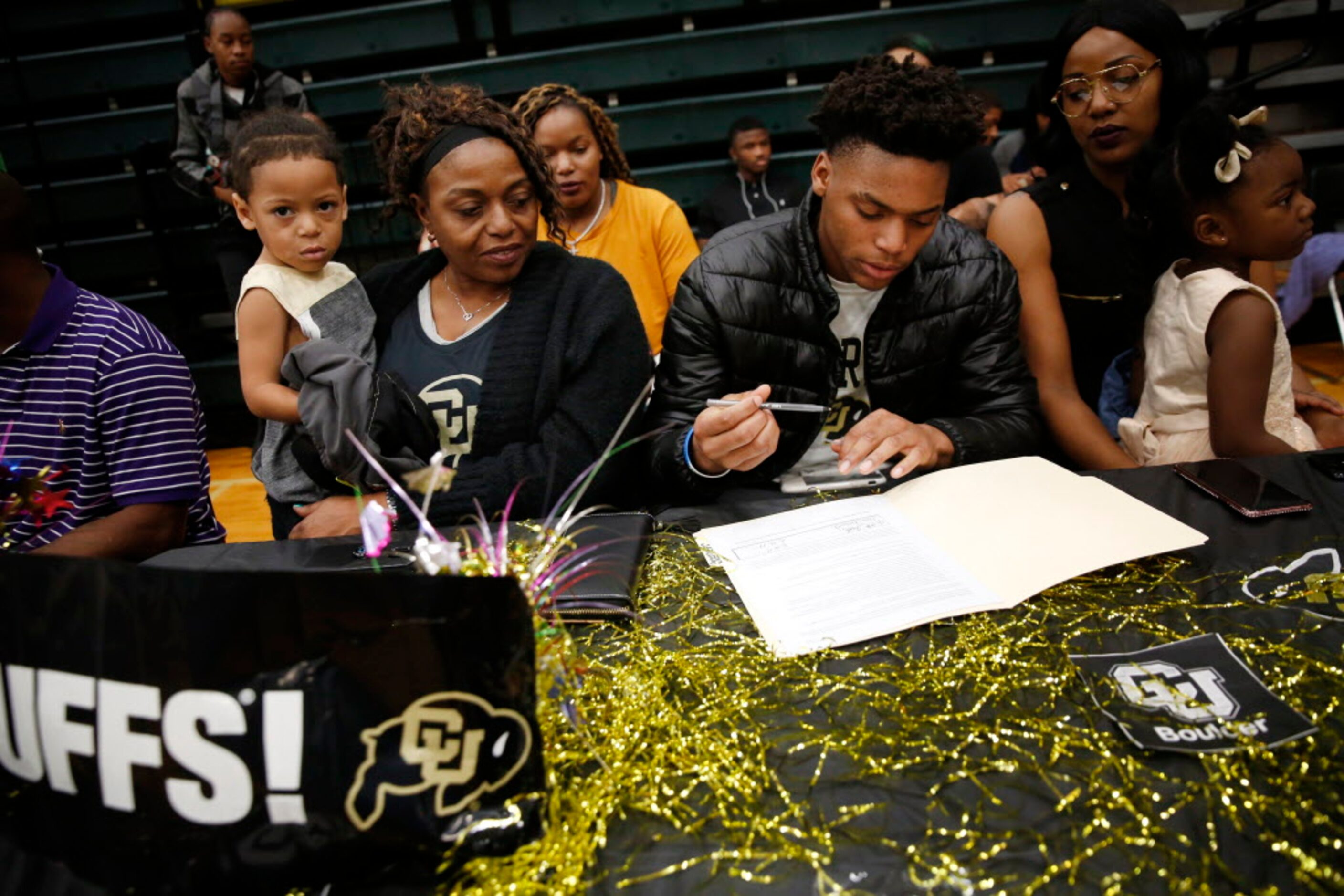 Wide receiver La'Vontae Shenault signs with University of Colorado alongside his mother...