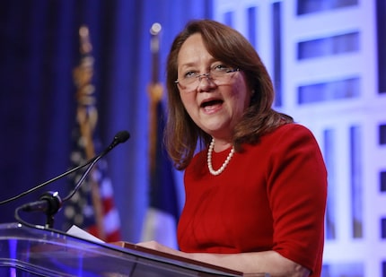 Texas first lady Cecilia Abbott, along with state protective services chief Hank Whitman,...