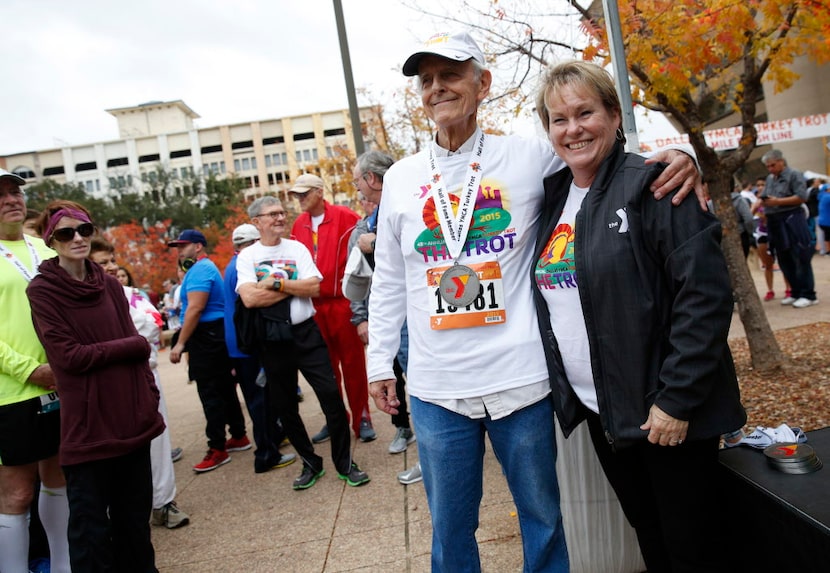 John T. Baker, a legacy runner in the 2015 Hall of Fame, poses for a photo with Sarah Byrom,...