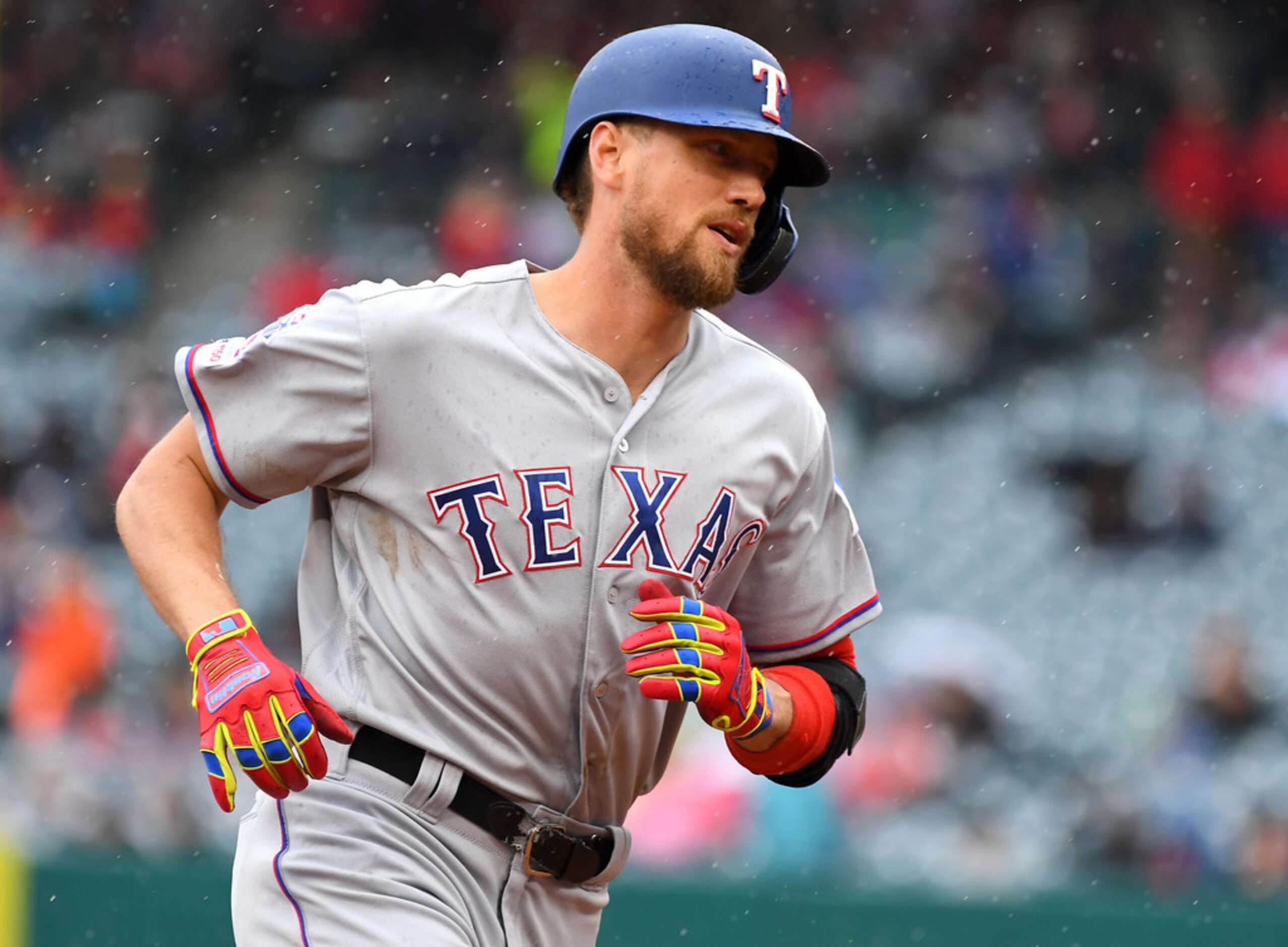 ANAHEIM, CA - MAY 26: Hunter Pence #24 of the Texas Rangers rounds the bases after hitting a...