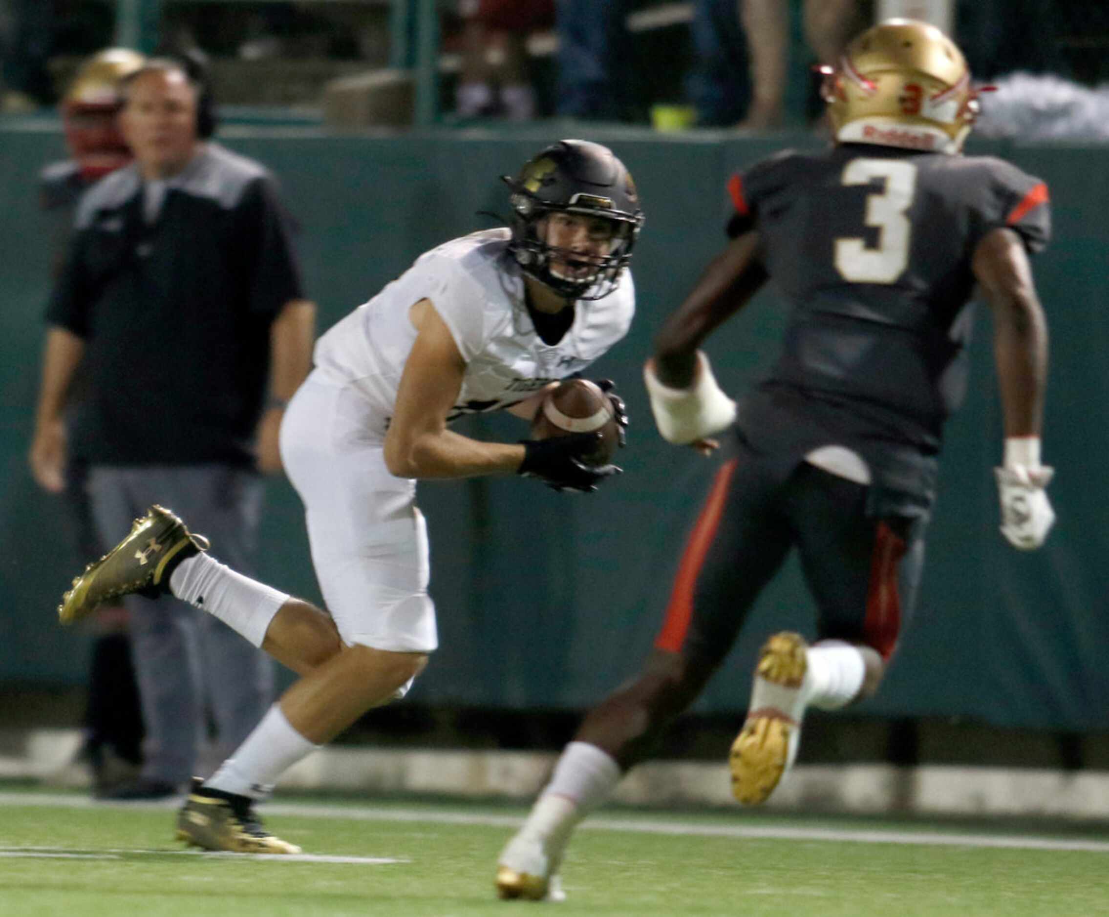 Mansfield receiver Michael Murray (16) tacks on extra yardage following a second quarter...