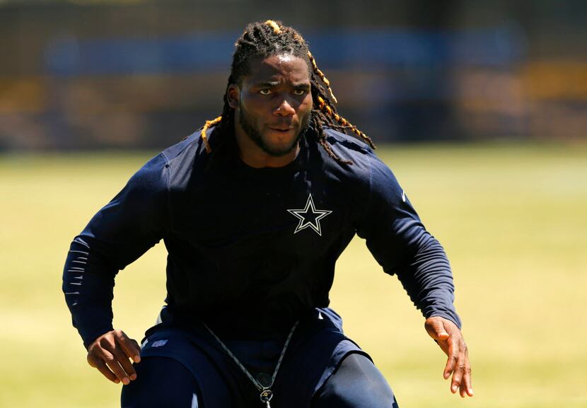 Injured Dallas Cowboys rookie outside linebacker Jaylon Smith works out during a morning...