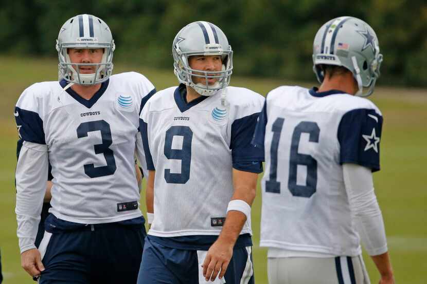 Dallas Cowboys quarterbacks Brandon Weeden (3), Tony Romo (9) and Matt Cassel (16) are...
