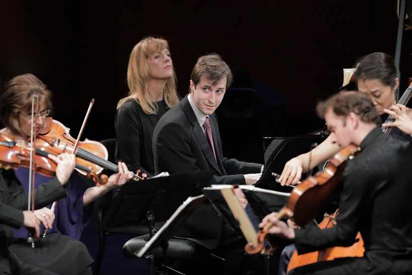 Pianist Kenneth Broberg performs with the Brentano String Quartet in the final round of the...