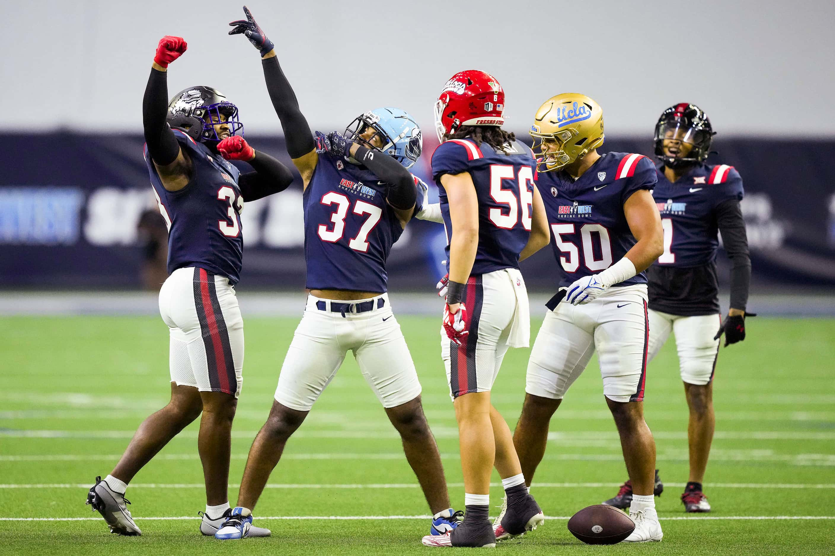 West defensive back Qwan'tez Stiggers of Toronto Argonauts  (37) celebrates after breaking...