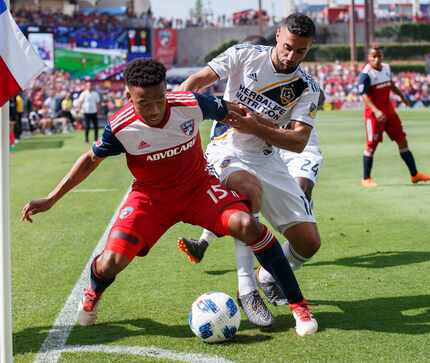 Jacori Hayes shield off Sebastian Lletget of the LA Galaxy. 12 MAY 2018:  FC Dallas v LA Galaxy