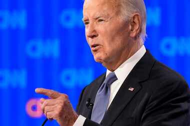 President Joe Biden speaks during a presidential debate with Republican presidential...