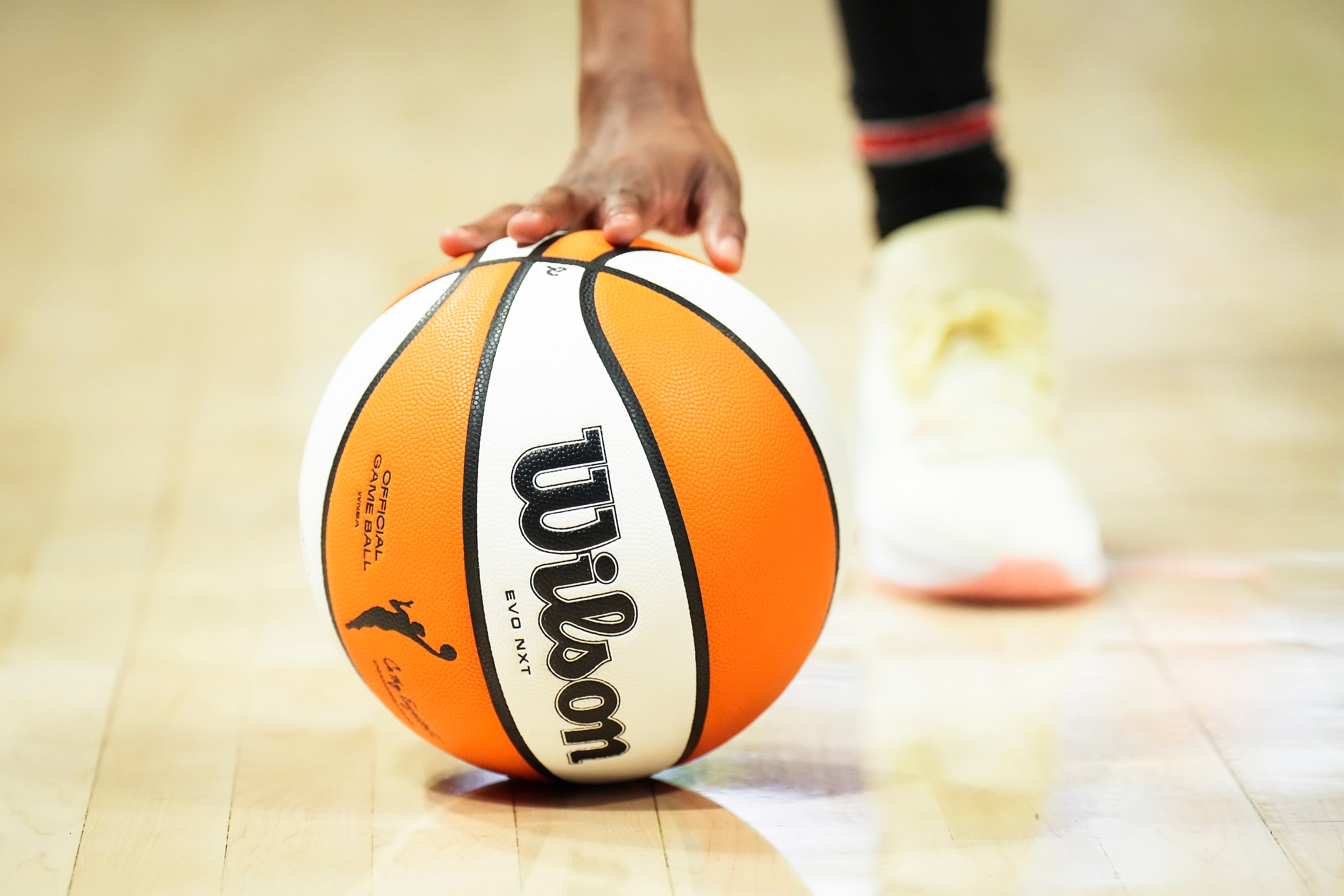 Dallas Wings guard Jasmine Dickey reaches for the ball during a stoppage in play in the...