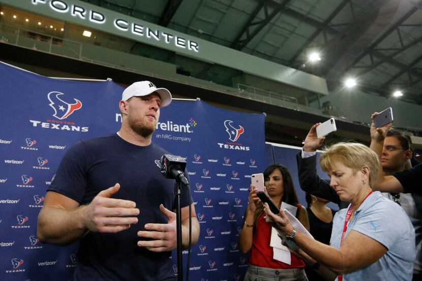 Houston Texans defensive end J.J. Watt (99) answers questions during a press conference...