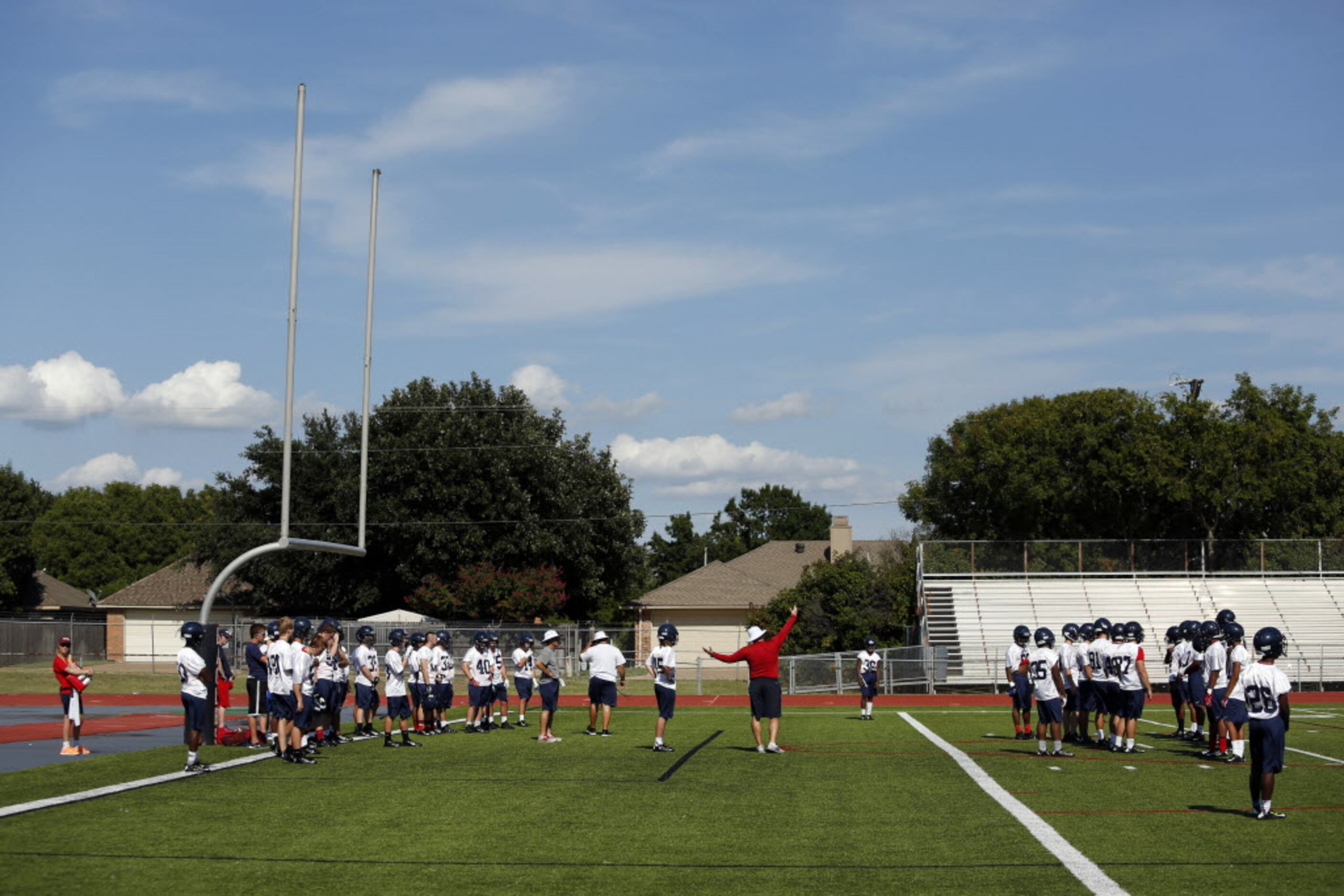 First day of football practice for defending state champion Allen at Allen's Old Eagle...