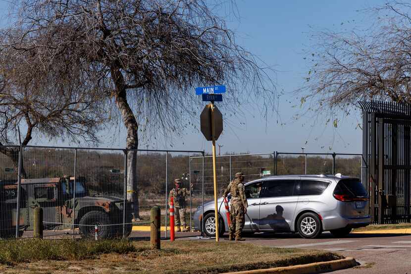 Texas Department of Public Safety officers guard an entrance to Shelby Park on Thursday,...