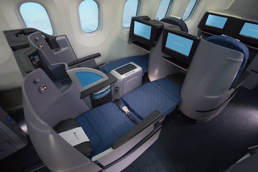 This photo from United Airlines shows a premium transcontinental seat flat bed. The airline...