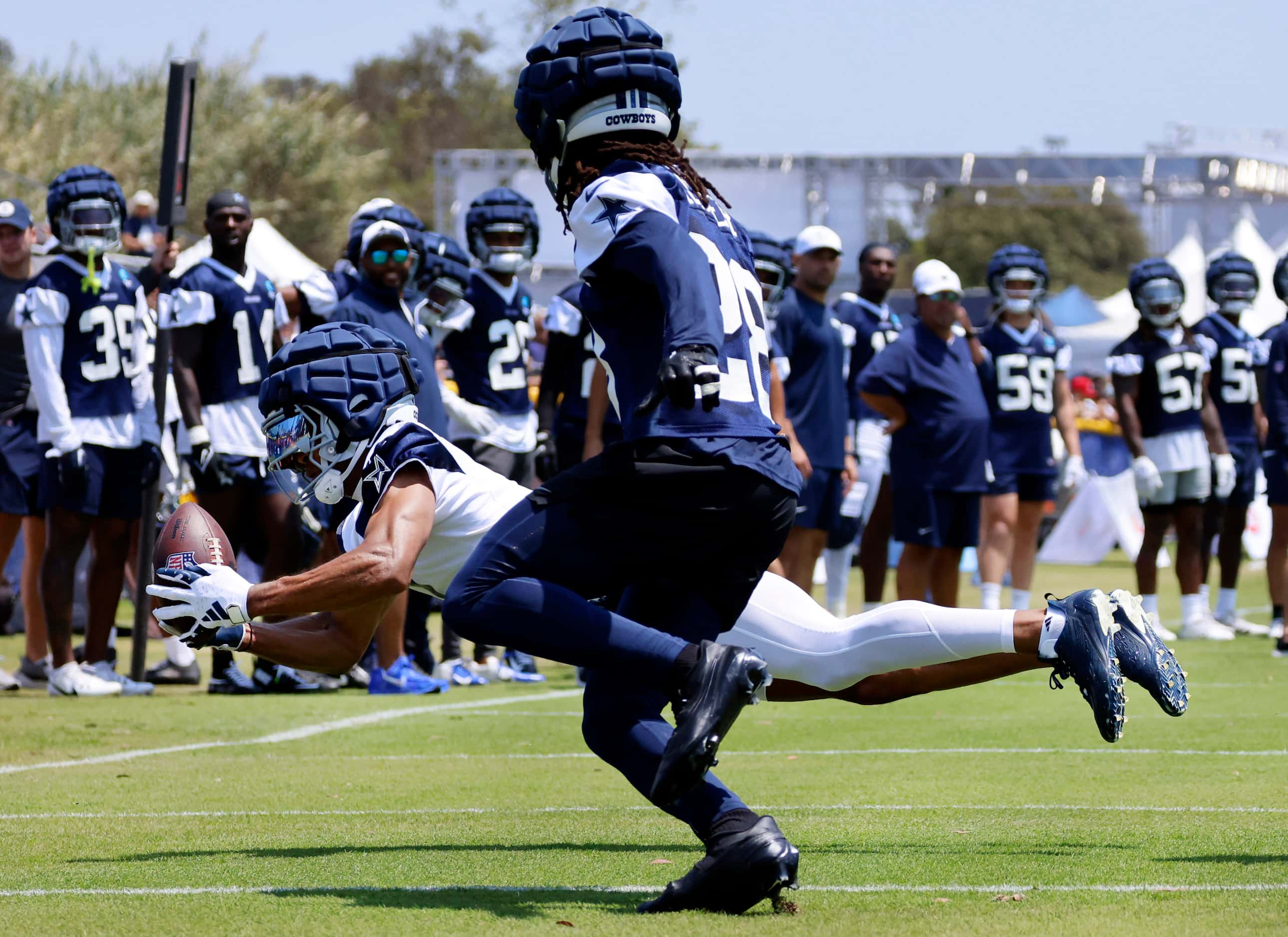 Dallas Cowboys wide receiver Jalen Tolbert (1) lays out for a long pass after the high pass...