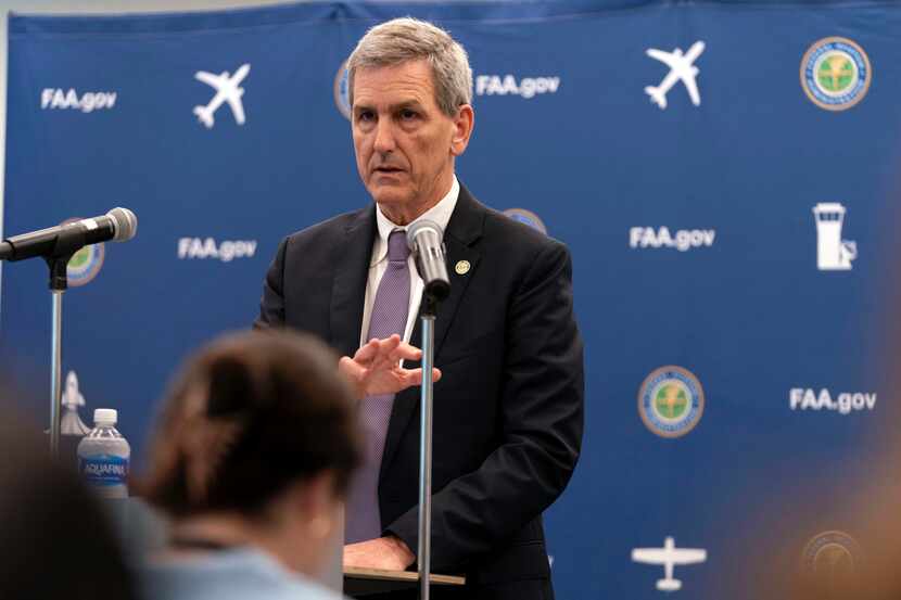 Federal Aviation Administration chief Mike Whitaker speaks at a news conference at FAA...