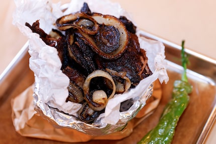 Bag of Golden Meat at Israeli pita restaurant Miznon is, actually, a bag of meat.