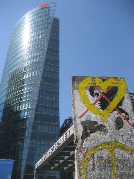 Segments of the Berlin Wall (front right) at Potsdamer Platz in the heart of Berlin. 