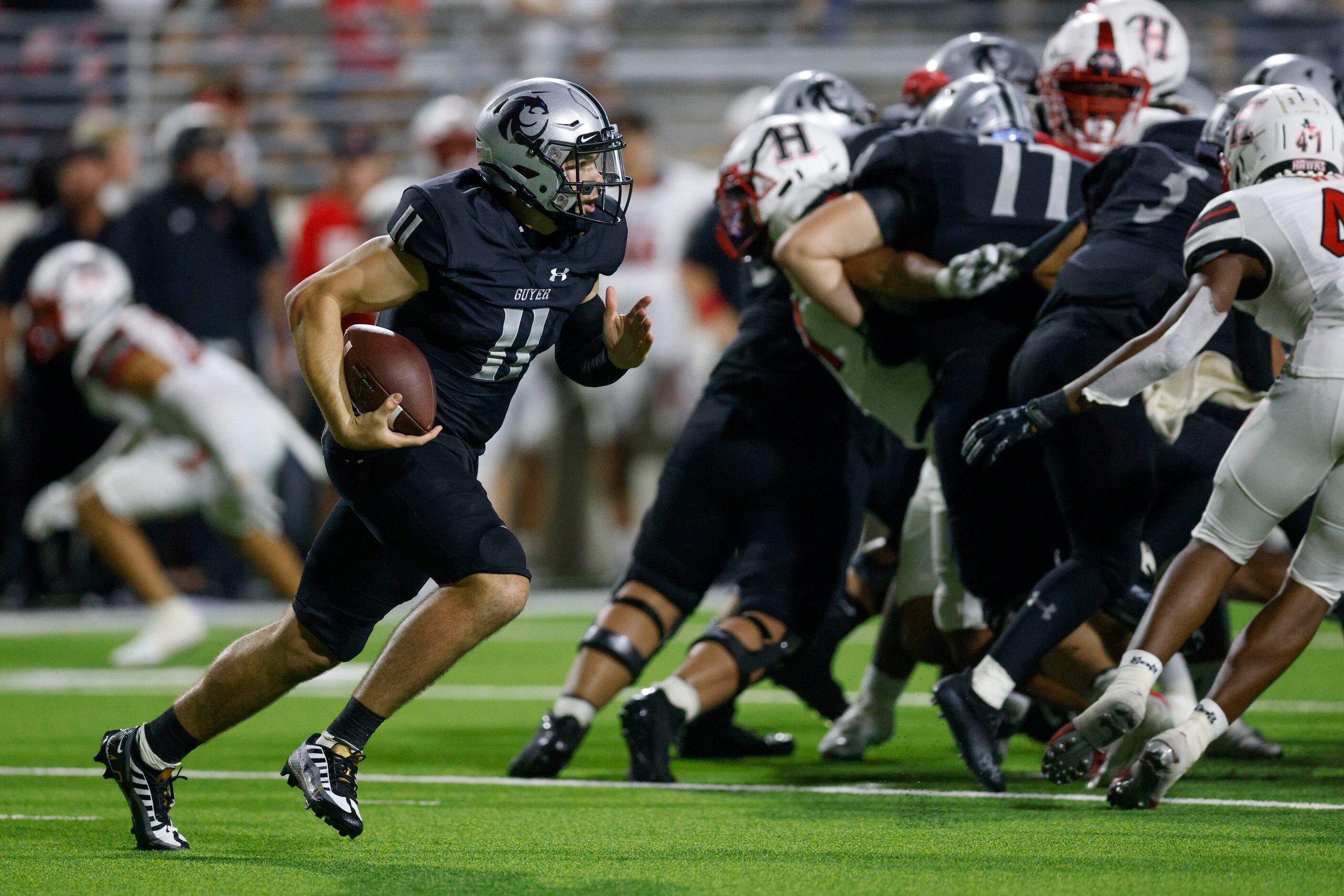 Denton Guyer quarterback Jackson Arnold (11) breaks free for a 64-yard touchdown against...