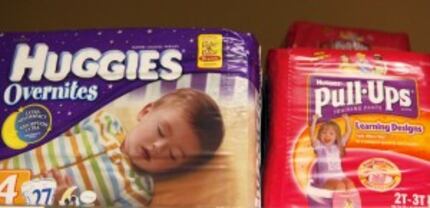  File photo, packages of Huggies and Pull-Ups, both Kimberly-Clark brands, are displayed at...