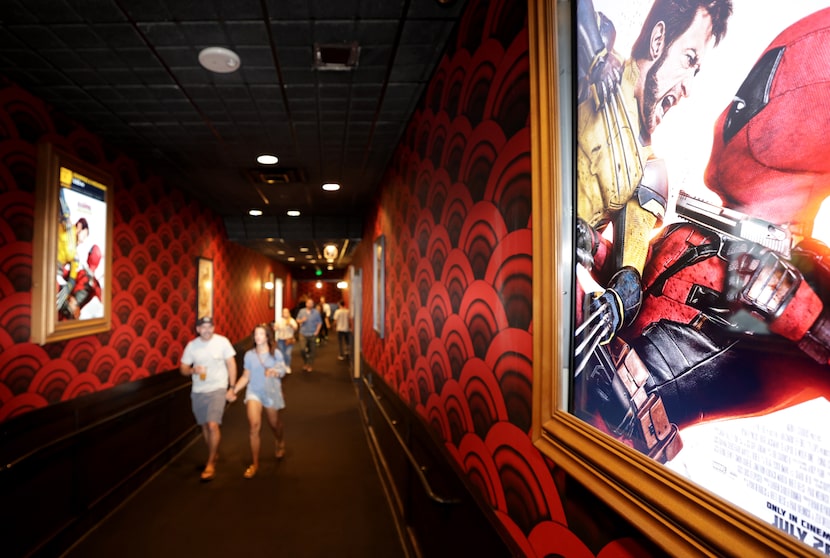 Guests head into the reopened Alamo Drafthouse in Richardson on Aug 9, 2024. The city...