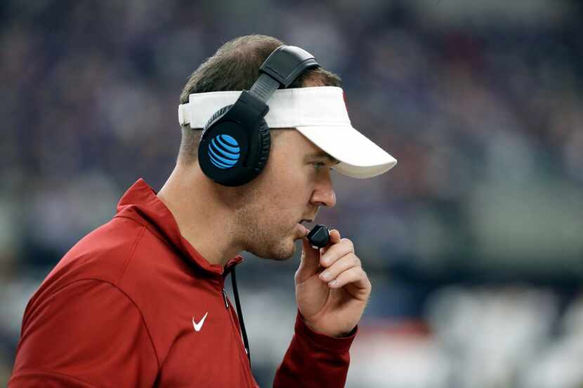 Oklahoma head coach Lincoln Riley makes a call fro the sideline in the second half of the...