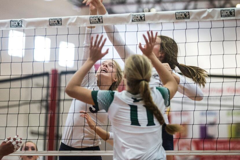 Prosper High School middle blocker and right side hitter  Shaylee Shore (11) attempts to...