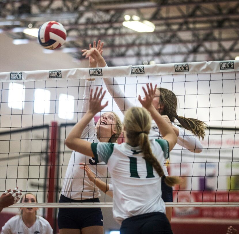 Prosper High School middle blocker and right side hitter  Shaylee Shore (11) attempts to...